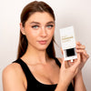 Model Holding a Box of Camellia Easy Fanning Lashes