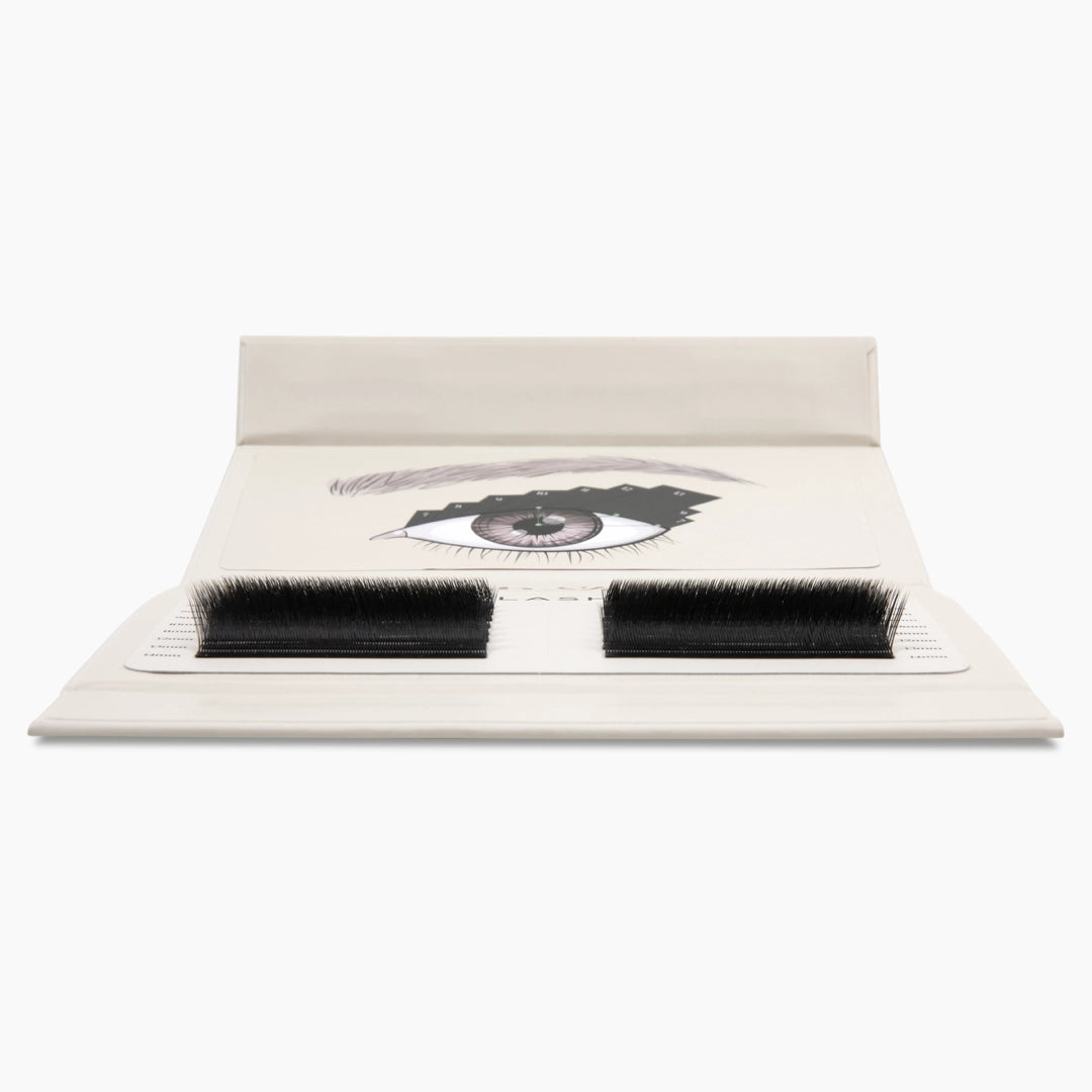 Front view of an open lash palette showcasing the curl and density of black Kitten Lash extension strips