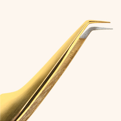 Close Up of Gold Fiber Tip Long Slim Mega Volume Tweezer