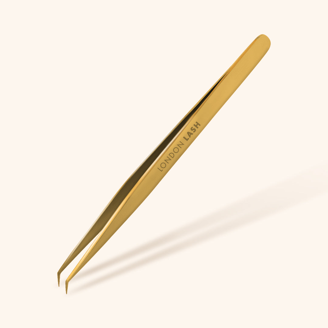 Multifunctional Tweezers in Gold