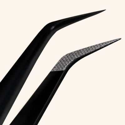 Close Up of Fiber Tip Eyelash Extensions Tweezers